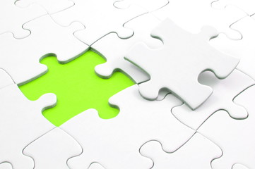 Obraz premium blank puzzle with missing piece