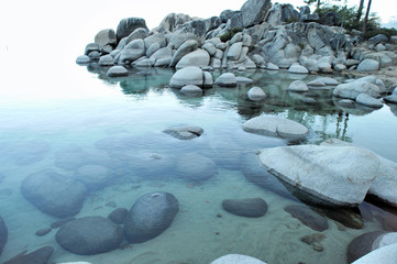 Clear Water And Granite Boulders