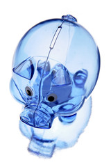 Empty plastic piggy bank isolated on white