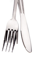 Knife and fork on white background