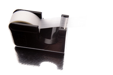 Adhesive tape dispenser isolated on white