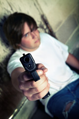 teen angry with handgun