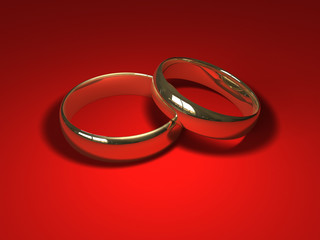 Wedding rings on red