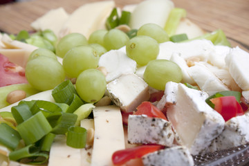 Cheese plate and grapes