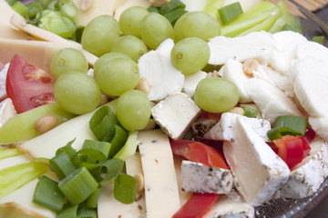 Cheese plate and grapes