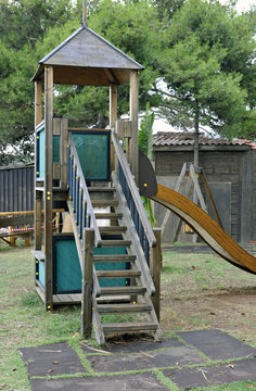 Playground wooden equipment with sliding