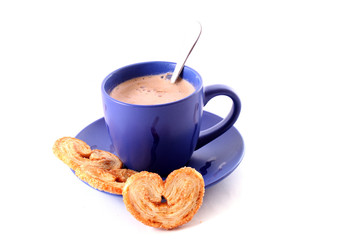 Cup of coffee with milk and cookies isolated over white backgrou