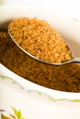 brown sugar on spoon isolated