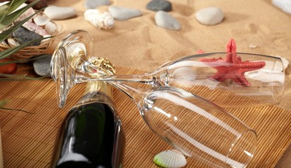 champagne sparkling on a beach