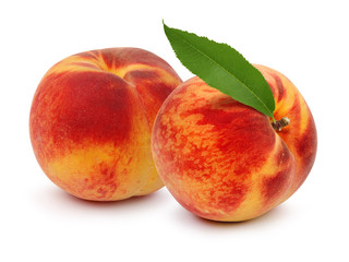 ripe peach fruit with green leafs 2