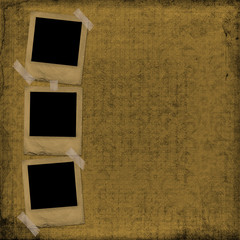 Old photoframes are hanging on the abstract background