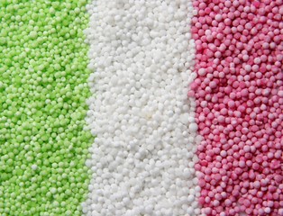 Colored sago arranged to resemble the italian flag