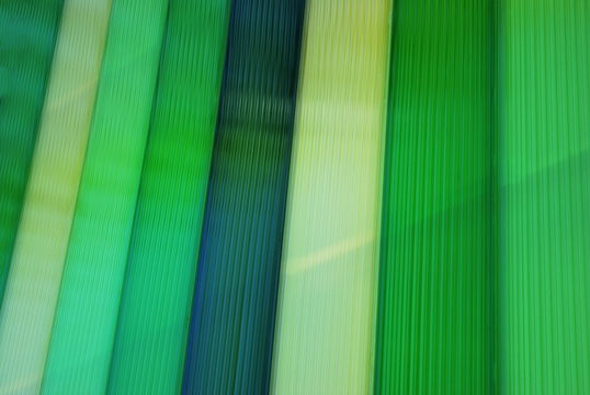 Green plastic stripes as background