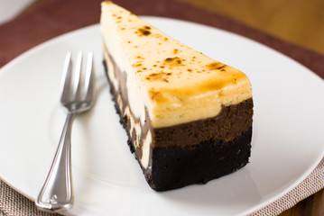 Close up of a delicious cheesecake with cocoa