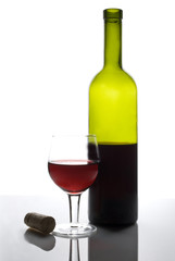 red wine glass and bottle