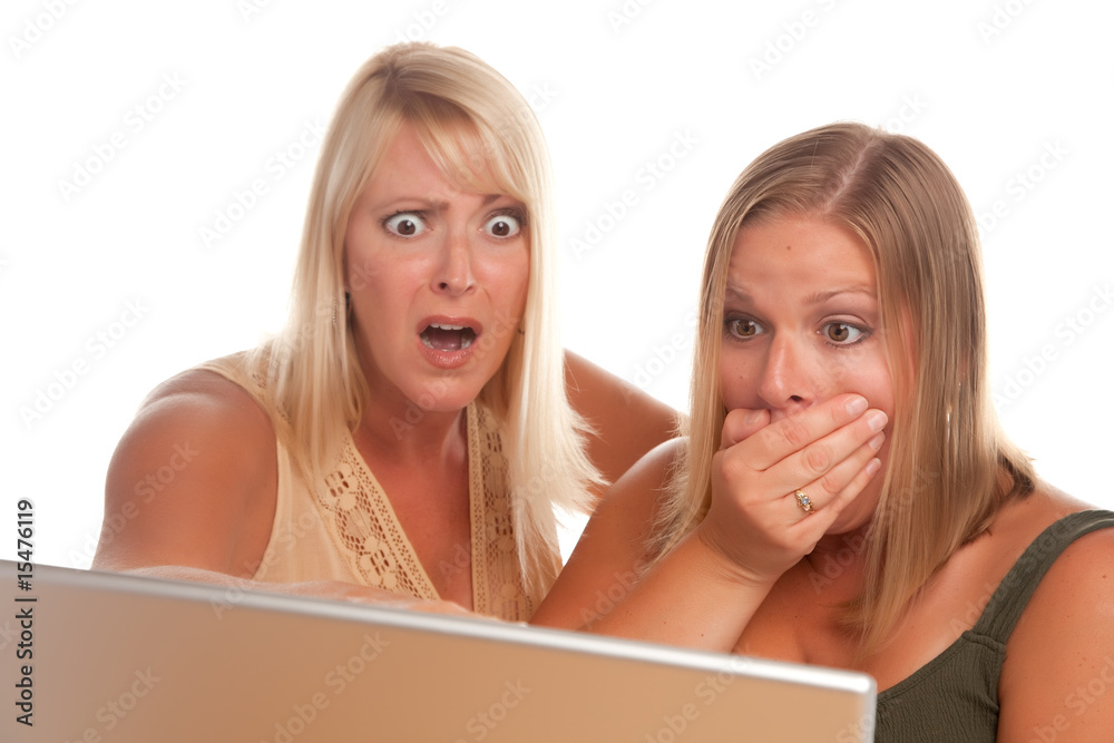 Wall mural two shocked women using laptop