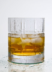 whiskey in the wet glass