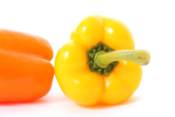 Orange pepper on white background