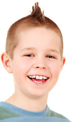 Portrait of young happy boy with mohawk, studio shot