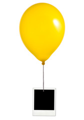 Yellow balloon and photo frame on white background