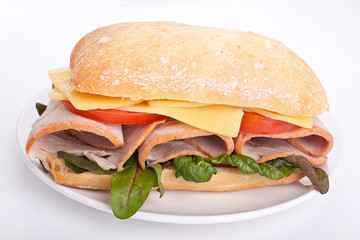 Ciabatta sandwich with meat,cheese and vegetables