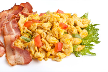 scrambled eggs and fried bacon