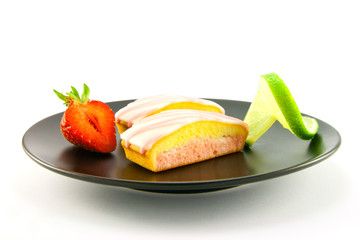 Strawberry Slices on a Black Plate