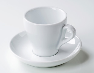 White cup and saucer