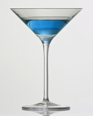 blue drink in cocktail glass
