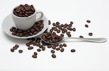 Coffee beans cup spoon saucer