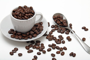 Coffee beans cup spoon saucer