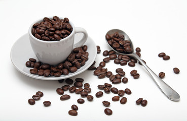 Coffee beans cup spoon saucer