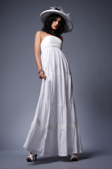 Brunette in white dress.
