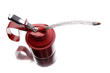 Naklejka premium Red oil can over white