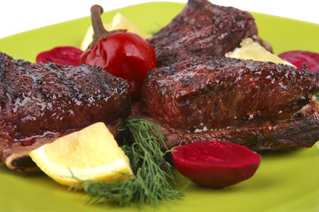 roast rib's on green dish
