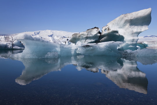 Iceberg and Reflection on the Lagoon, Jokulsarlon, Iceland