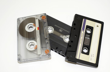 old audio tapes on white background
