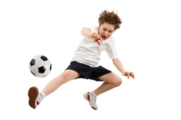 Boy playing football isolated on white background