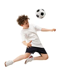 Foto op Canvas Boy playing football isolated on white background © Jacek Chabraszewski