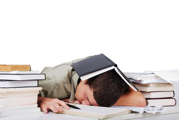 Young man fallen asleep after long reading