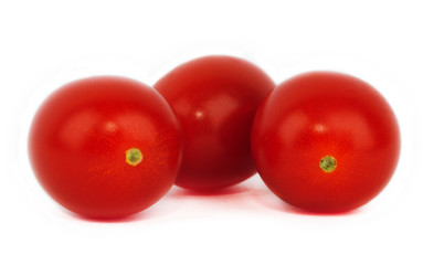 Fresh tomatoes on white background
