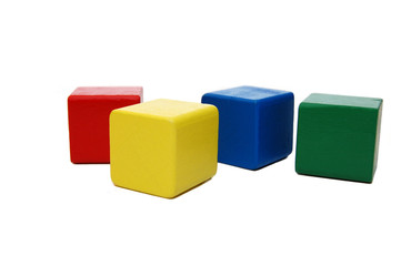 wooden colourful childrens blocks isolated white
