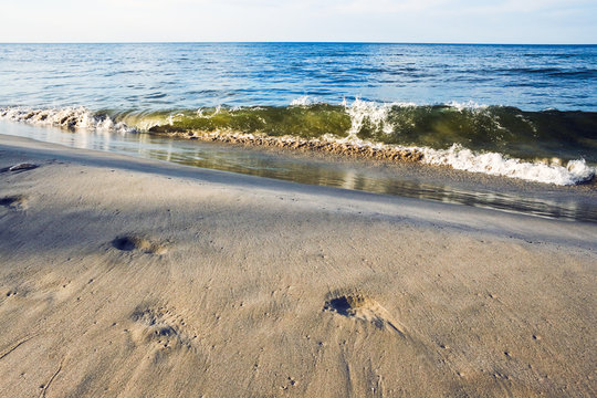 Foot steps in sea sand