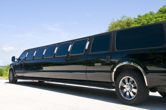 Black Stretch limousine waiting for guests to arrive