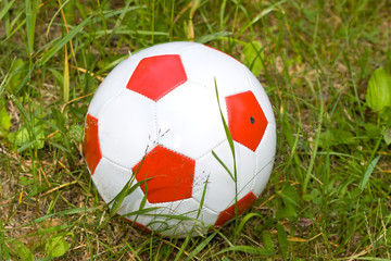 Close-up soccer ball in a grass field