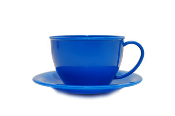 Dark blue cup - toys on a white background