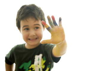 Happy child with painted hands