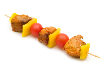 grilled pork kebabs on white background