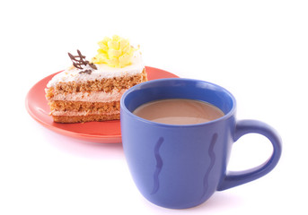 Cake and cup isolated on white