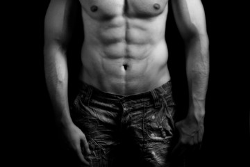 Fototapeta na wymiar Torso of muscular man with sexy abdomen